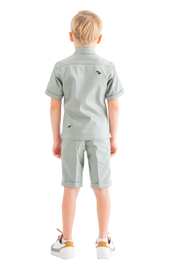 Rhyme Kids - Boy wearing moss green short-sleeve shirt and matching shorts from Rhyme by Rupamani.