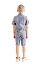 Rhyme Kids - Boy wearing Pebble Grey Rhyme by Rupamani short-sleeve shirt and matching shorts.