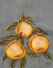 Capri girls set detail — hand-embroidered lemon shorts with botanical print cape