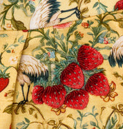 Cyprus girls three-piece set detail — strawberry and butterfly motifs on sheer embroidered cape