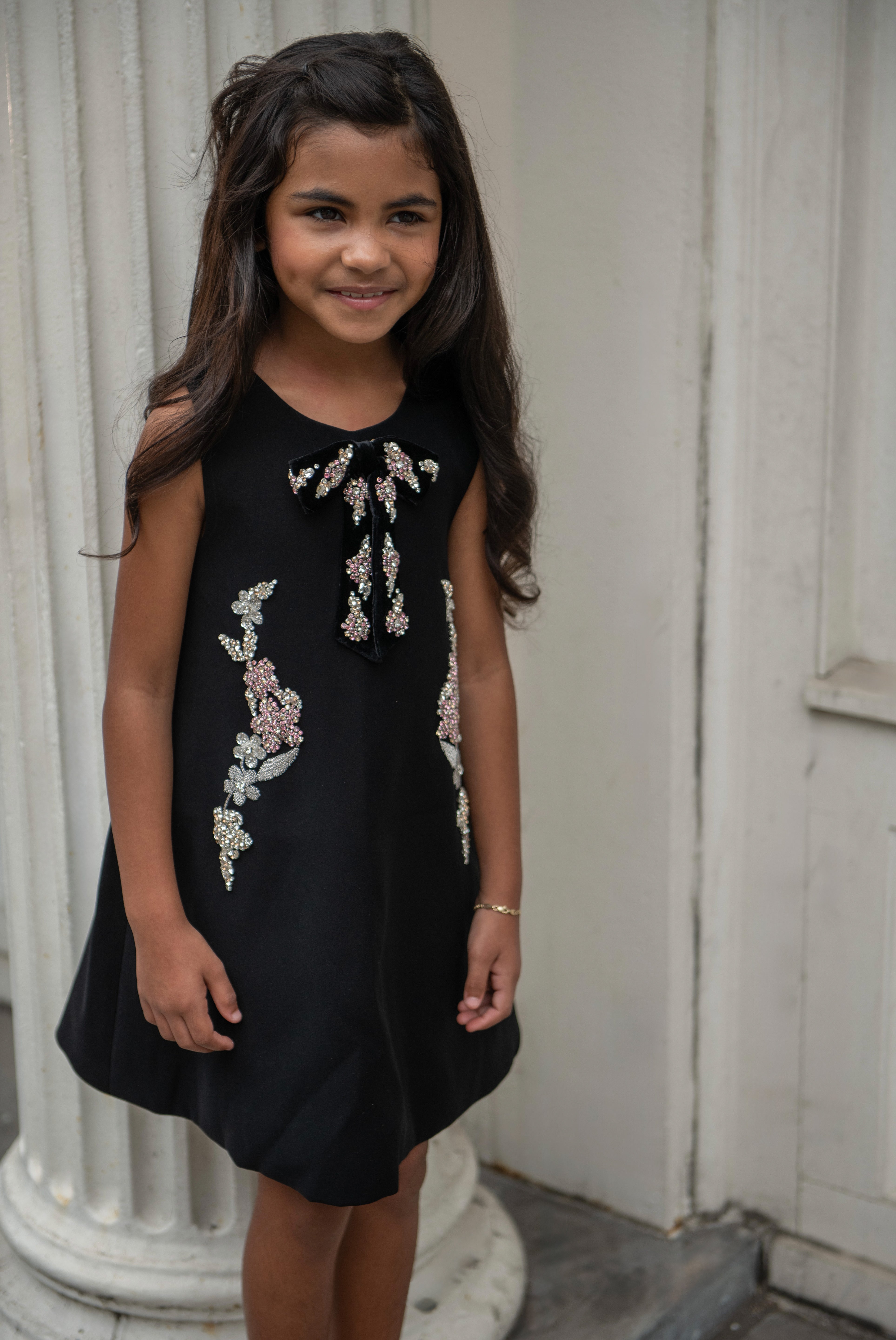 Dune girls crepe dress lifestyle photo — luxury children's occasion wear by Rhyme Kids