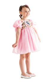 Rhyme Kids - Pink puff-sleeve dress with floral embroidery bodice, worn by girl, Rhyme by Rupamani.